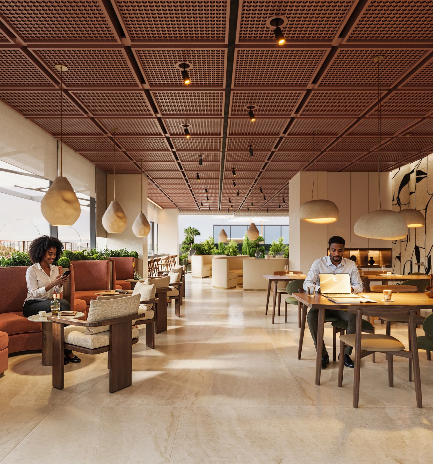 Residents working in the Jabali Towers co-working lounge